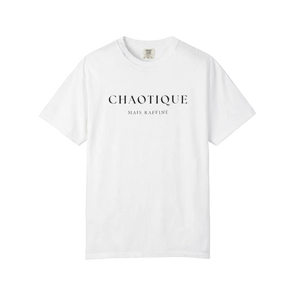 A white short-sleeve crewneck t-shirt with 'CHAOTIQUE MAIS RAFFINE' printed in black serif text across the chest, displayed flat against a neutral gray background.