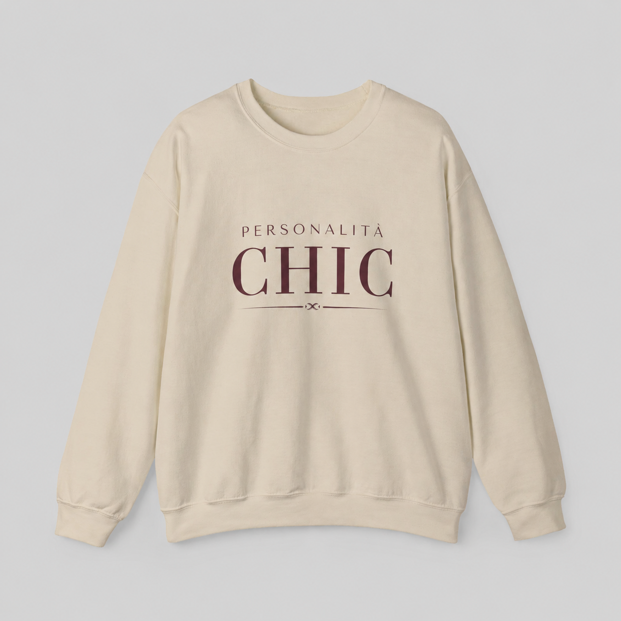 Cream crewneck sweatshirt featuring dark burgundy “PERSONALITÀ CHIC” text on the front.