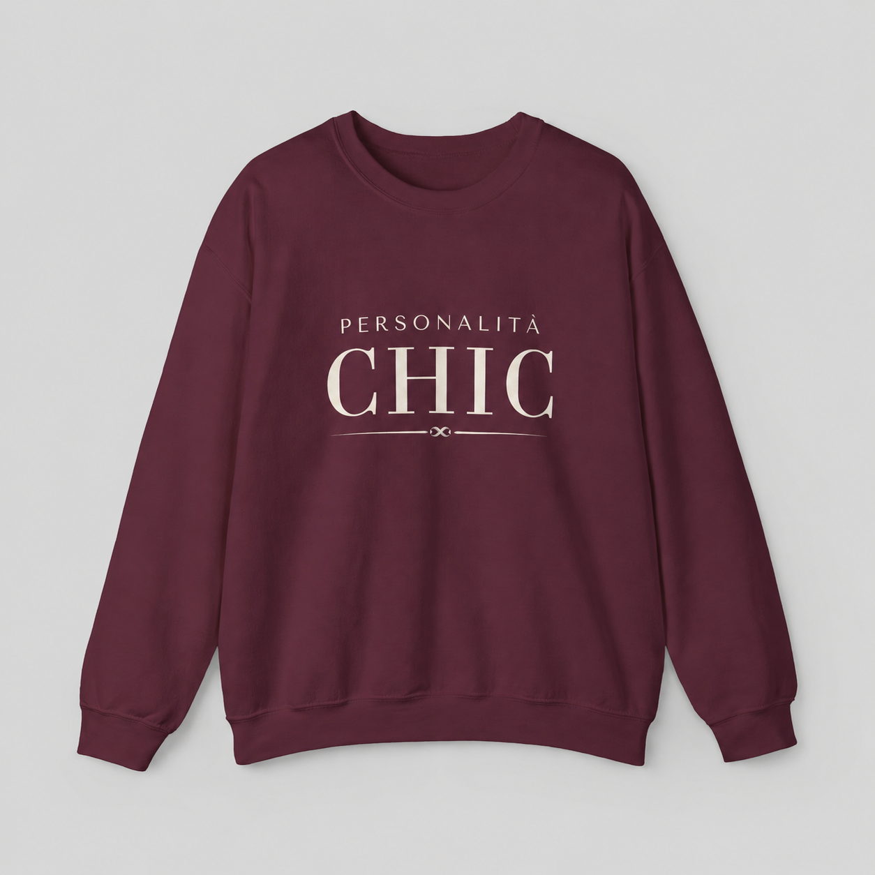 Maroon colored crewneck sweatshirt featuring white “PERSONALITÀ CHIC” text on the front.