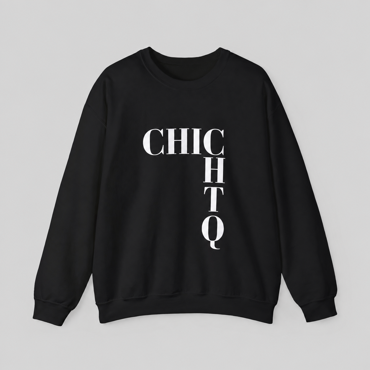 A black crewneck sweatshirt with a bold white graphic print spelling 'CHICHO' vertically on the front, displayed against a neutral gray background.
