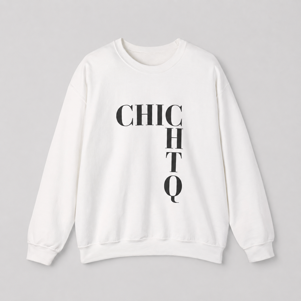A white crewneck sweatshirt with a bold black graphic spelling 'CHICHO' stacked vertically on the front, displayed flat against a neutral gray background.