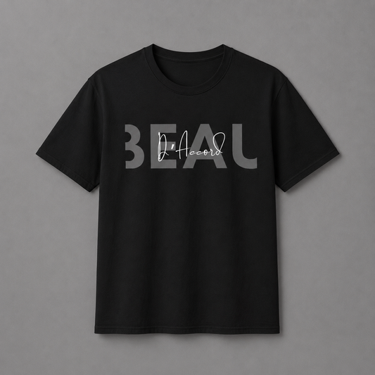 Black short-sleeve crewneck T-shirt featuring a gray “BEAU” graphic with a white cursive “D’Accord” overlay, displayed against a neutral gray studio background.