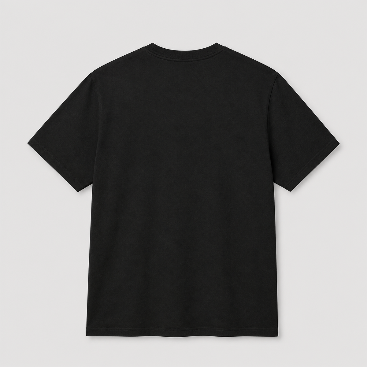 A plain black short-sleeve crewneck t-shirt shown from the back, laid flat against a light gray background.