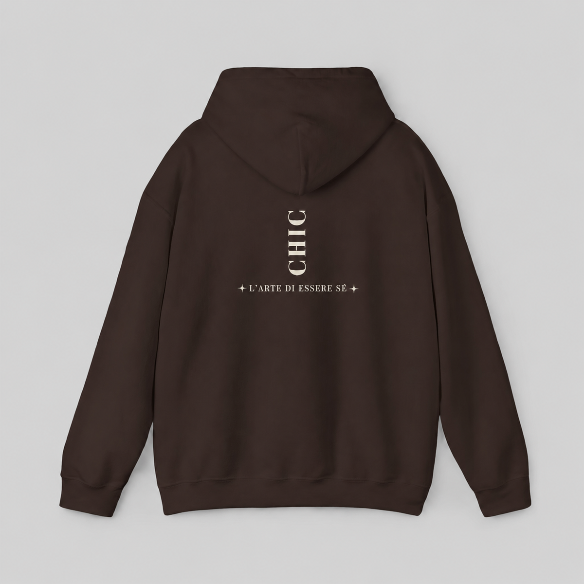 A brown pullover hoodie featuring a dark brown vertical CHIC back graphic and French-inspired typography, photographed from behind against a clean light gray studio background.