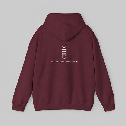 A maroon pullover hoodie featuring a dark brown vertical CHIC back graphic and French-inspired typography, photographed from behind against a clean light gray studio background.