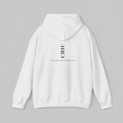 A white pullover hoodie featuring a dark brown vertical CHIC back graphic and French-inspired typography, photographed from behind against a clean light gray studio background.