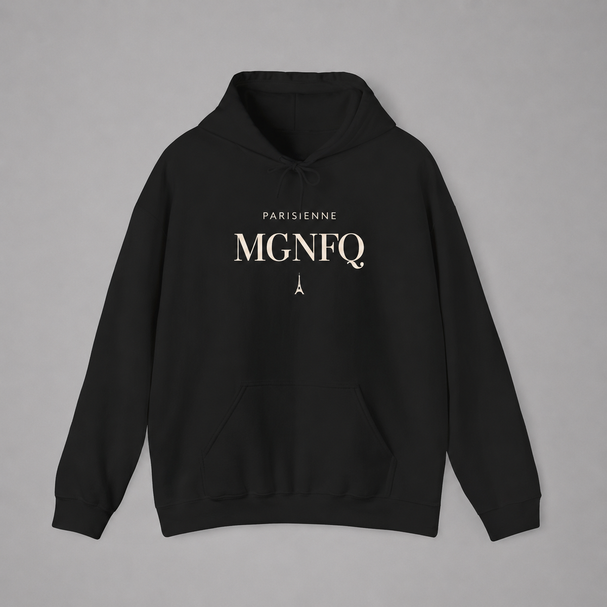 A black pullover hoodie with a front pocket and drawstring hood, featuring the text 'PARISIENNE MGNFQ' and a small Eiffel Tower graphic in white on the chest, displayed against a neutral gray background.