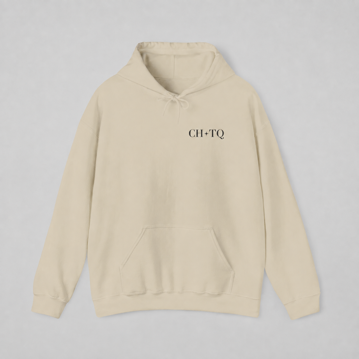 Beige pullover hoodie shown from the back, featuring a dark burgundy circular CHIC CHAOTIC graphic with subtle star accents against a neutral gray studio background.