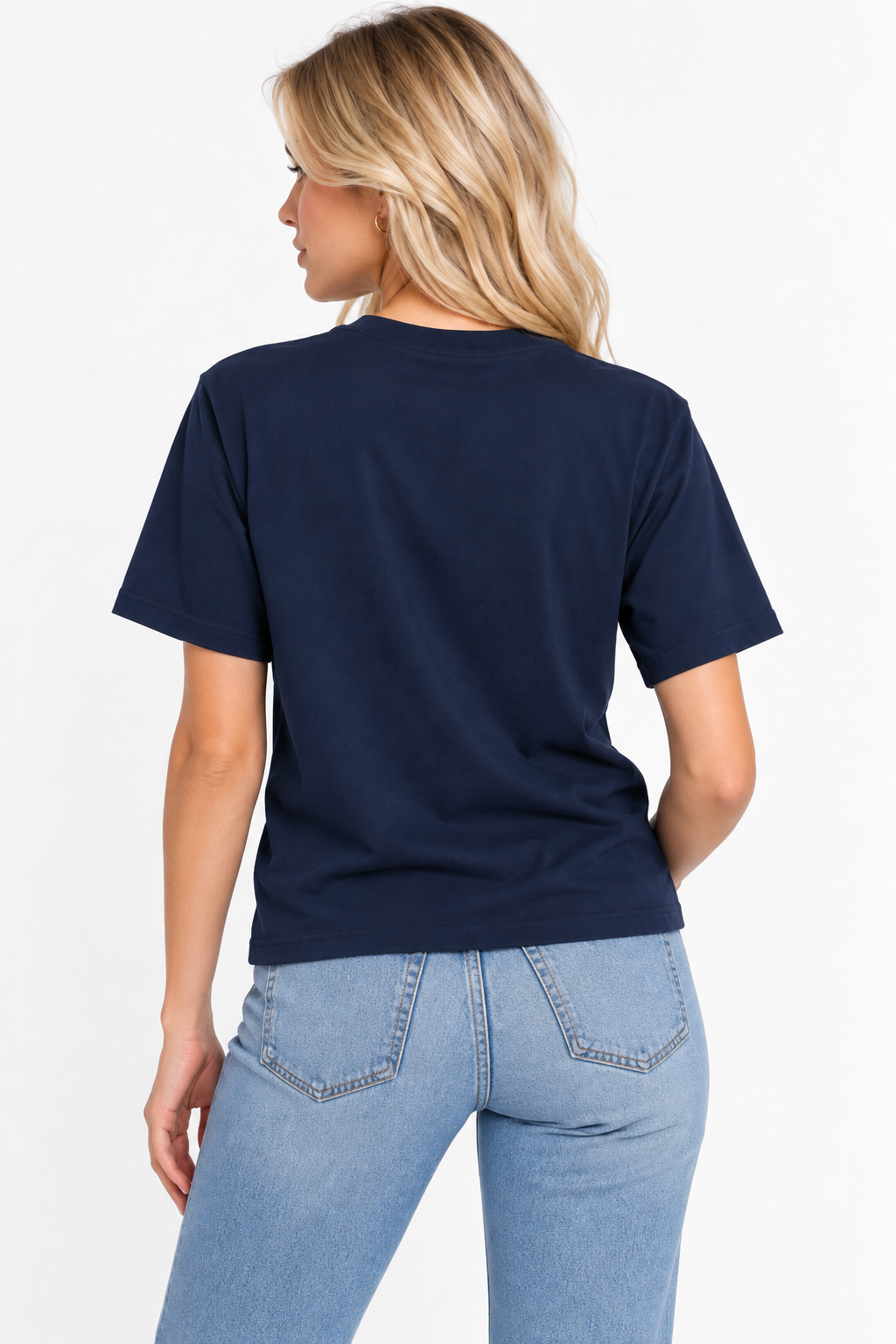 A woman viewed from the back wearing the CHIC by CHTQ Design Women’s Graphic T-Shirt in navy with light blue jeans against a clean white studio background.