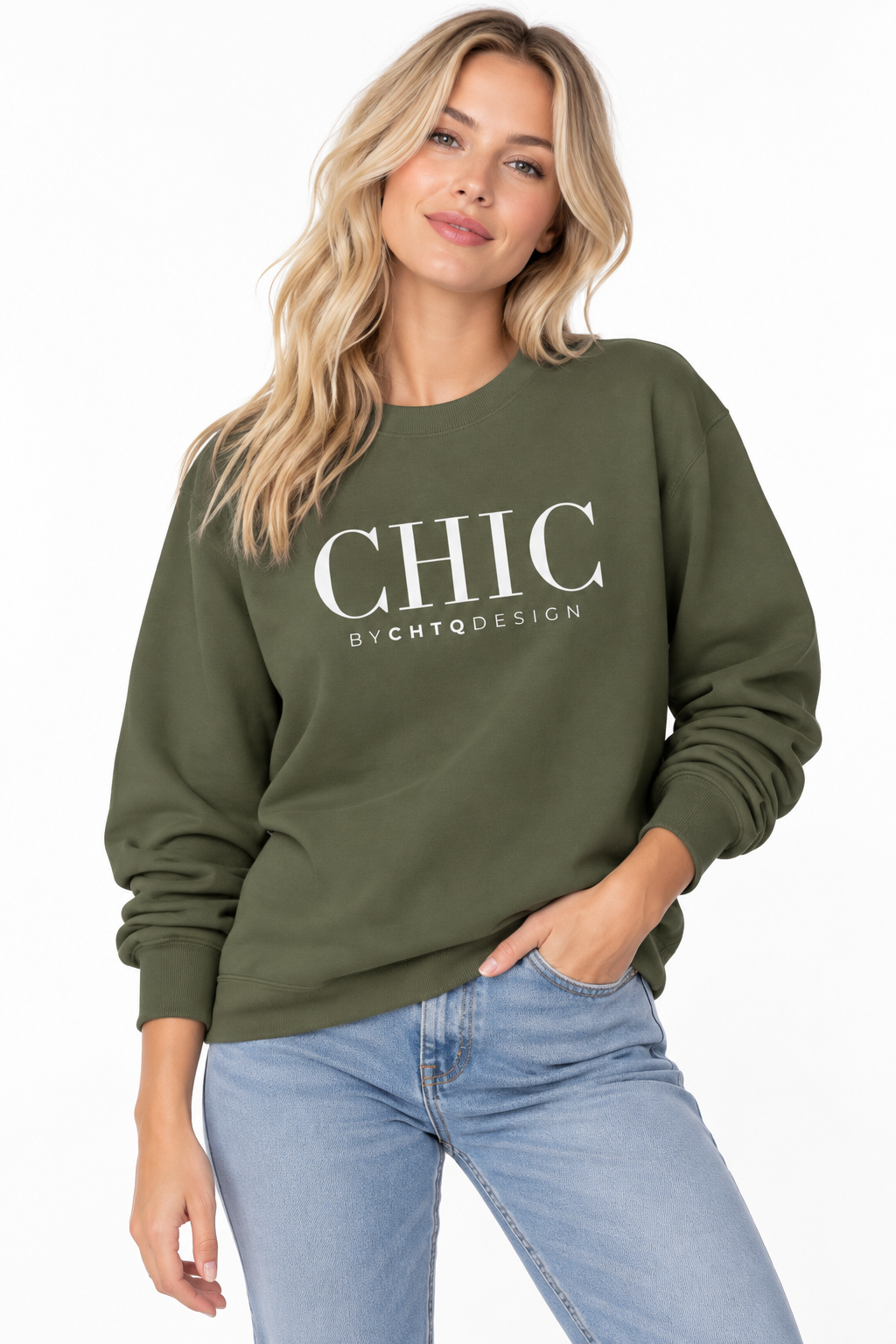 Woman wearing a green CHIC by CHTQ Design crewneck sweatshirt with a white graphic print, paired with light blue jeans against a white studio background.