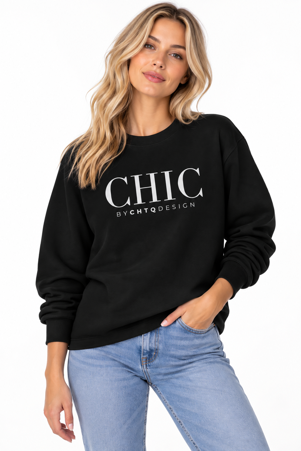Woman wearing a black CHIC by CHTQ Design crewneck sweatshirt with a white graphic print, paired with light blue jeans against a white studio background.