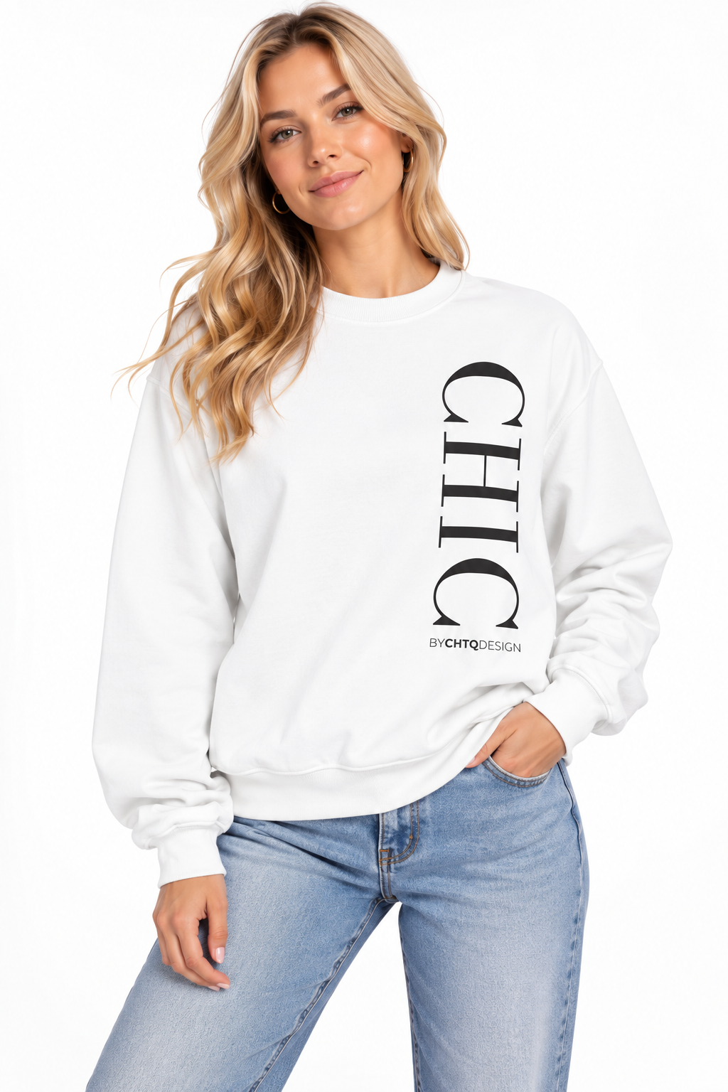 A woman wearing a white crewneck sweatshirt with a large vertical black 'CHIC' graphic and smaller 'BY CHTQ DESIGN' text, paired with light blue jeans against a plain white background.