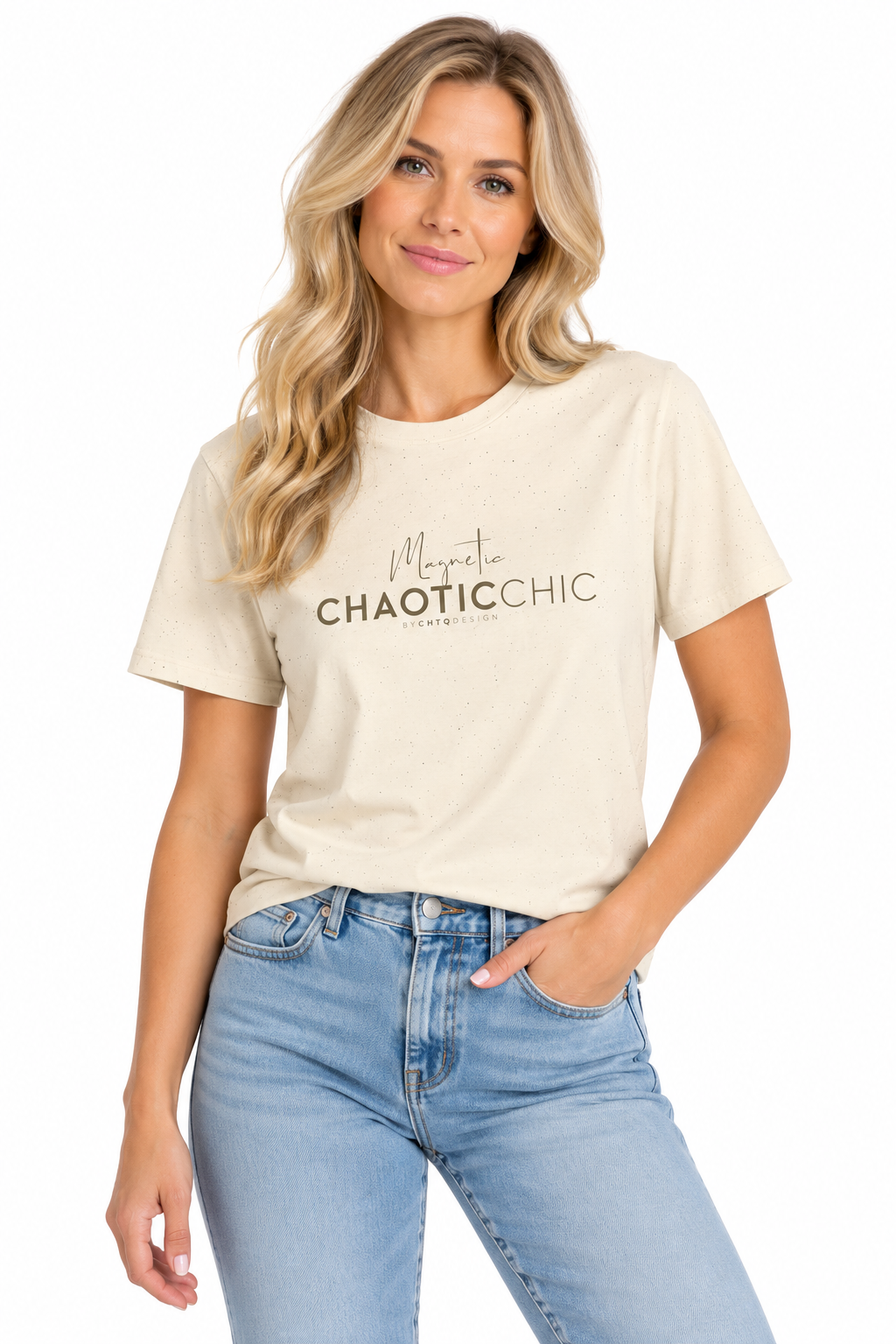 A woman modeling a cream-colored graphic T-shirt with 'Magnetic Chaotic Chic' printed on the front, paired with light-wash blue jeans against a plain white background.
