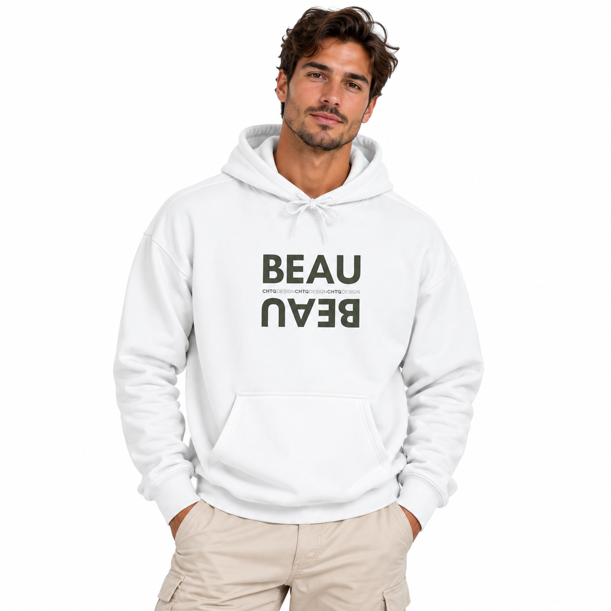 A man modeling a white BEAU graphic hoodie with a mirrored dusty pink BEAU print and CHTQ Design detail on the chest, paired with beige pants against a white studio background.