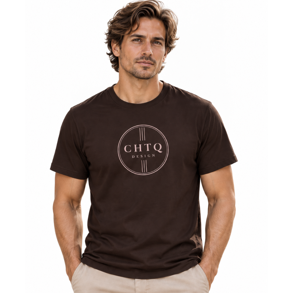 A man wearing a dark brown crewneck t-shirt with a circular 'CHTQ DESIGN' logo printed on the chest, paired with beige trousers, against a plain white background.