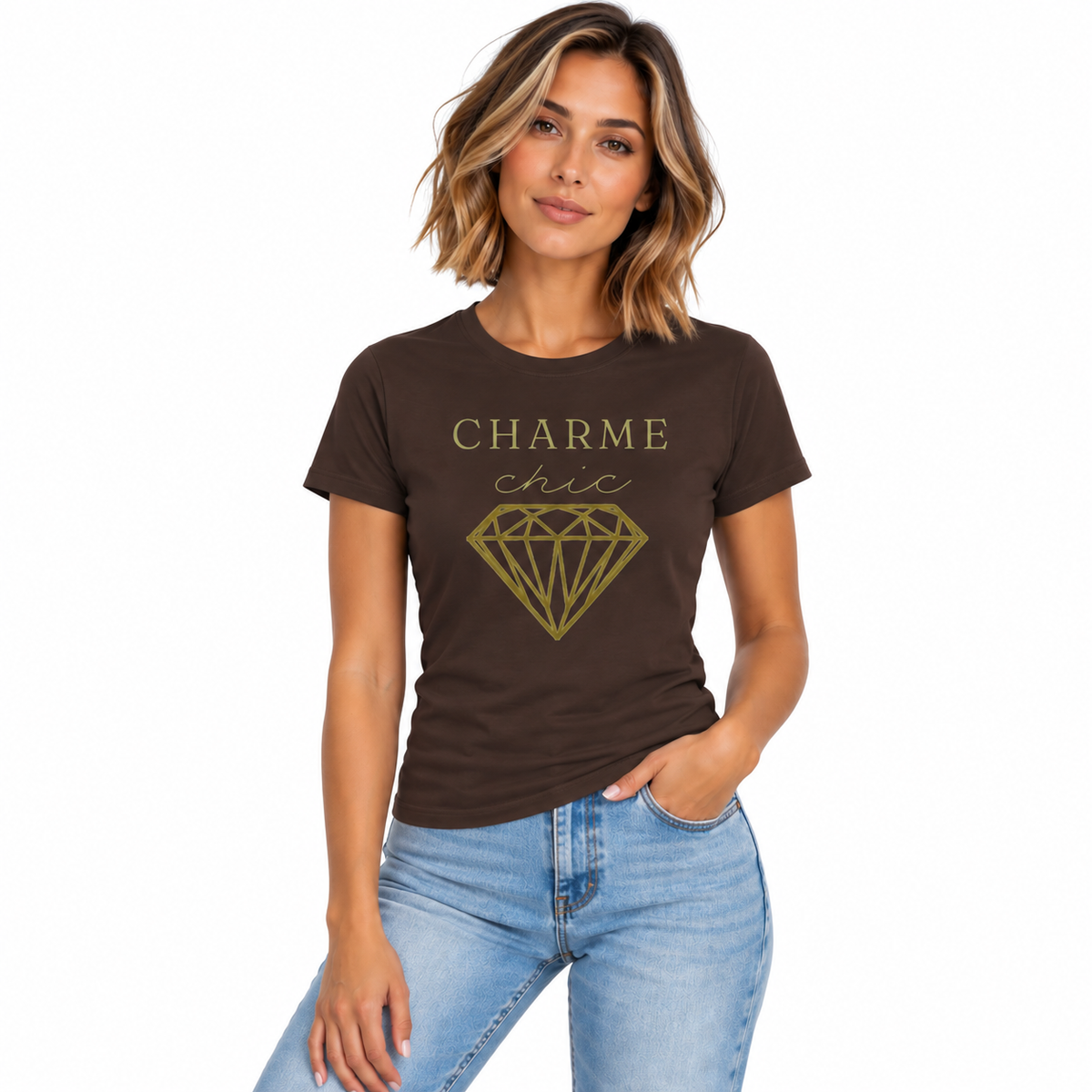 A woman modeling a dark brown short-sleeve t-shirt with a gold graphic that reads 'CHARME chic' and a diamond illustration, paired with light blue jeans against a plain white background.