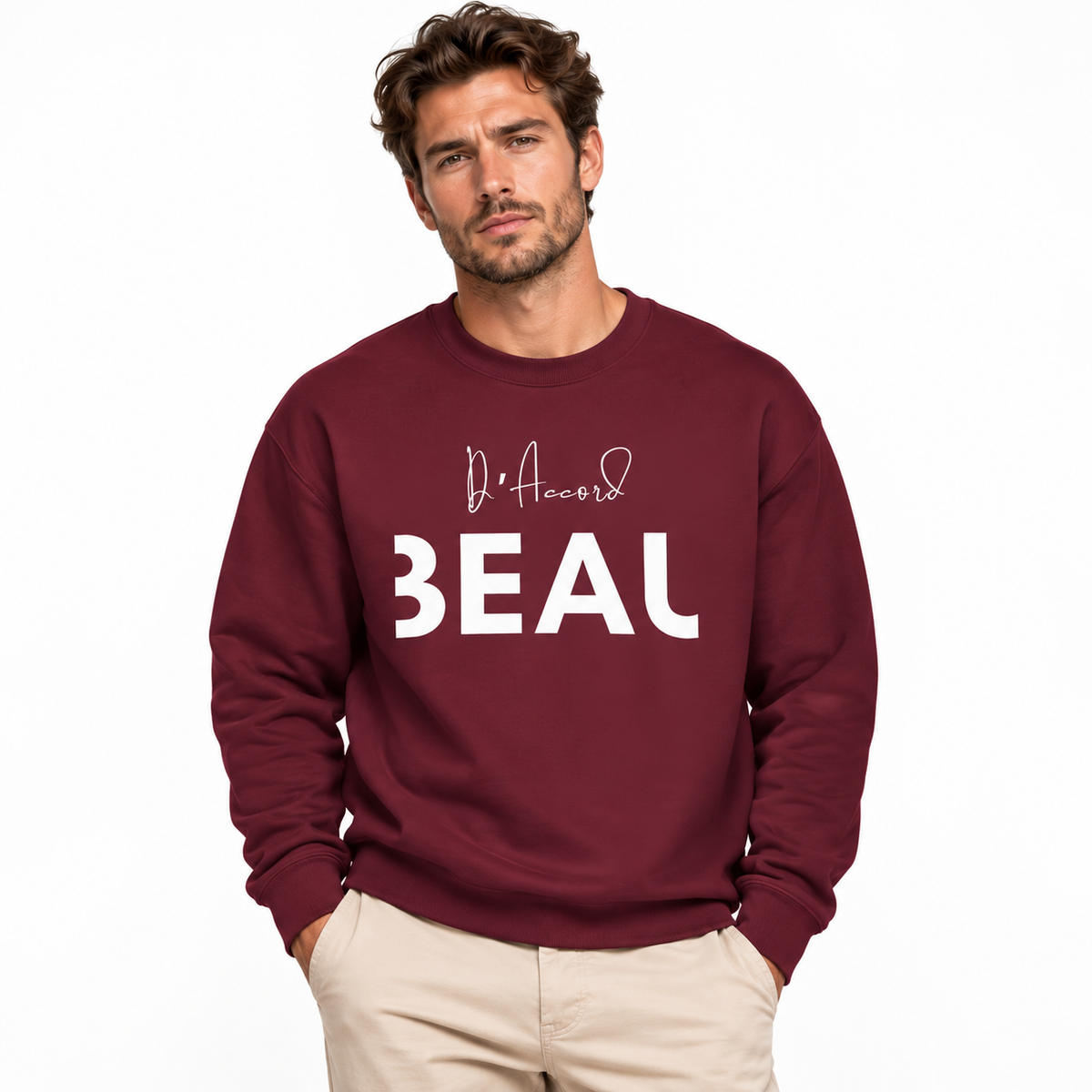 Male model wearing a maroon BEAU D’ACCORD graphic crewneck sweatshirt with white lettering against a white studio background.