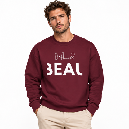 Male model wearing a maroon BEAU D’ACCORD graphic crewneck sweatshirt with white lettering against a white studio background.