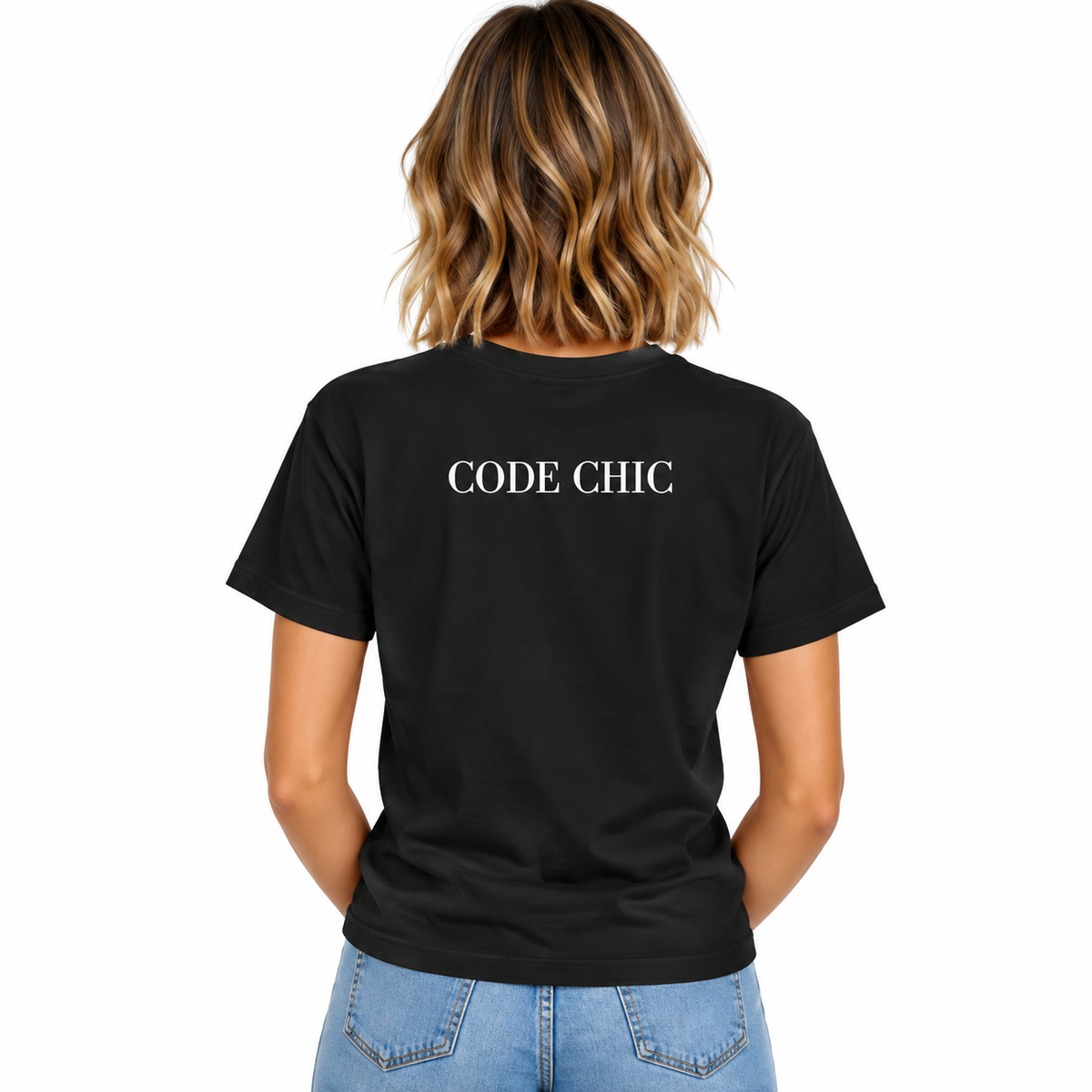 A woman viewed from the back wearing a black short-sleeve T-shirt with the words 'CODE CHIC' printed in white across the upper back, paired with light blue jeans on a plain white background.