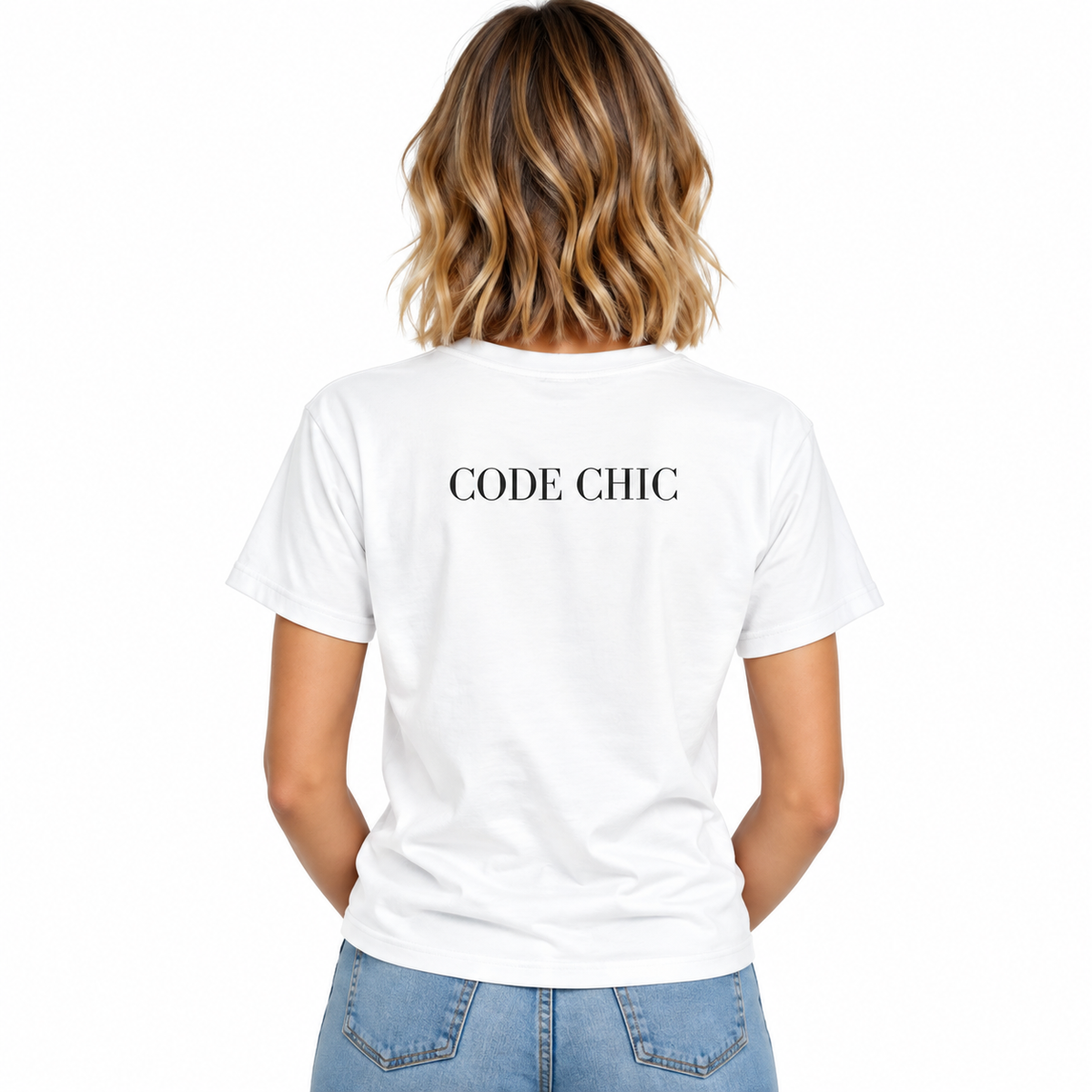 A woman viewed from the back wearing a white short-sleeve T-shirt with the words 'CODE CHIC' printed in white across the upper back, paired with light blue jeans on a plain white background.