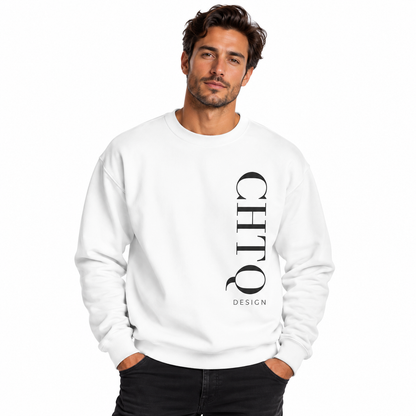 A man wearing a white crewneck sweatshirt with a vertical black CHTQ DESIGN graphic on the front, paired with black jeans against a plain white studio background.