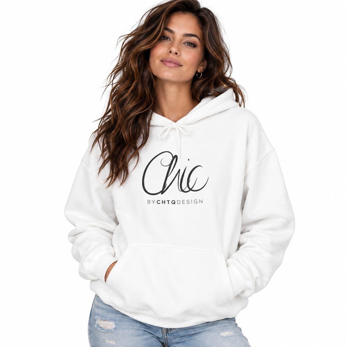 A woman wearing a white pullover hoodie with a black graphic print that reads 'Chic BY CHTQ DESIGN' on the front, paired with light-wash distressed jeans, set against a plain white background.