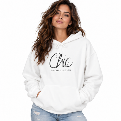 A woman wearing a white pullover hoodie with a black graphic print that reads 'Chic BY CHTQ DESIGN' on the front, paired with light-wash distressed jeans, set against a plain white background.