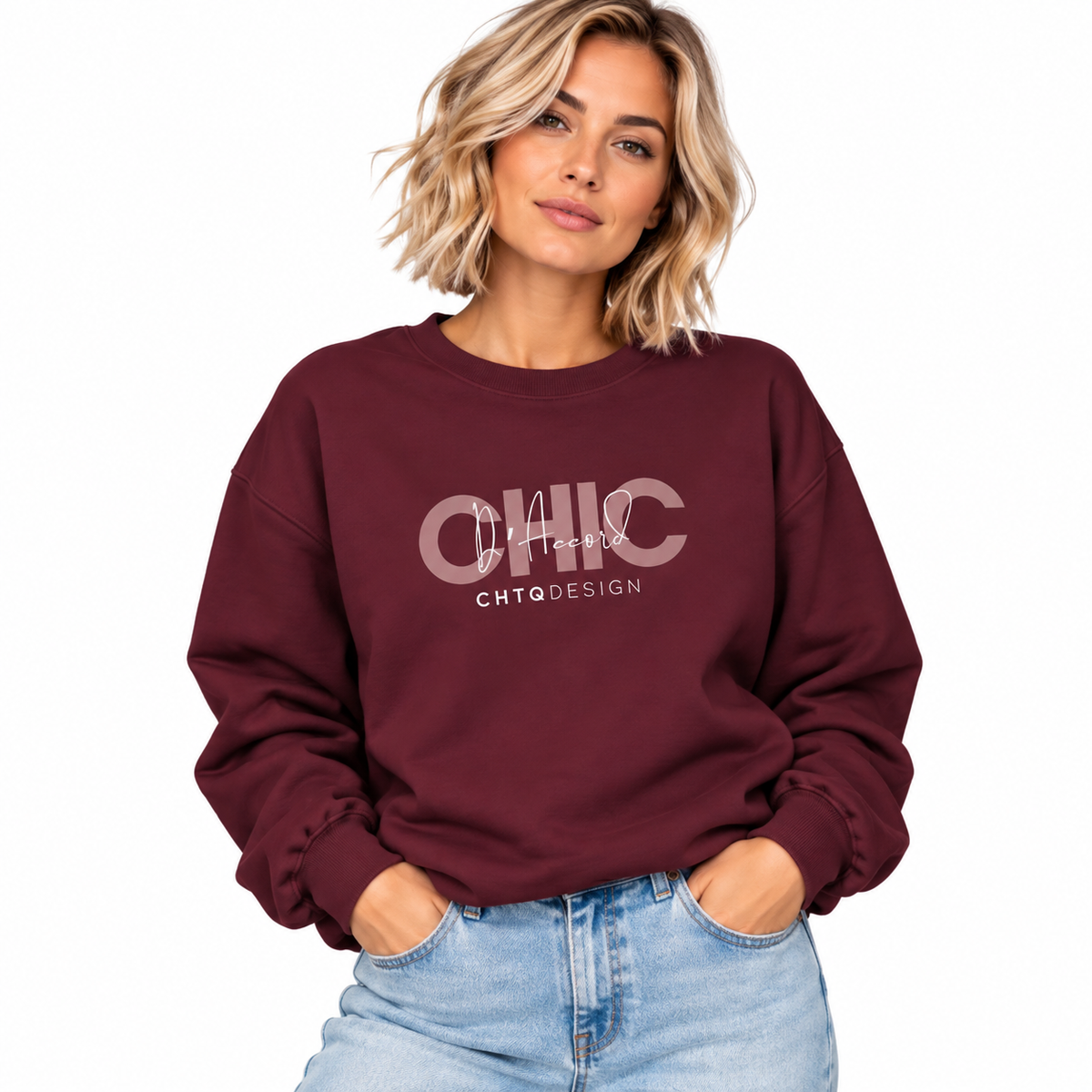 Woman wearing CHIC D’Accord maroon crewneck sweatshirt with light wash jeans