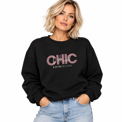 Woman wearing CHIC D’Accord black crewneck sweatshirt with light wash jeans