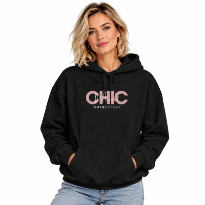 Woman wearing CHIC D’Accord graphic hoodie in black with light denim jeans