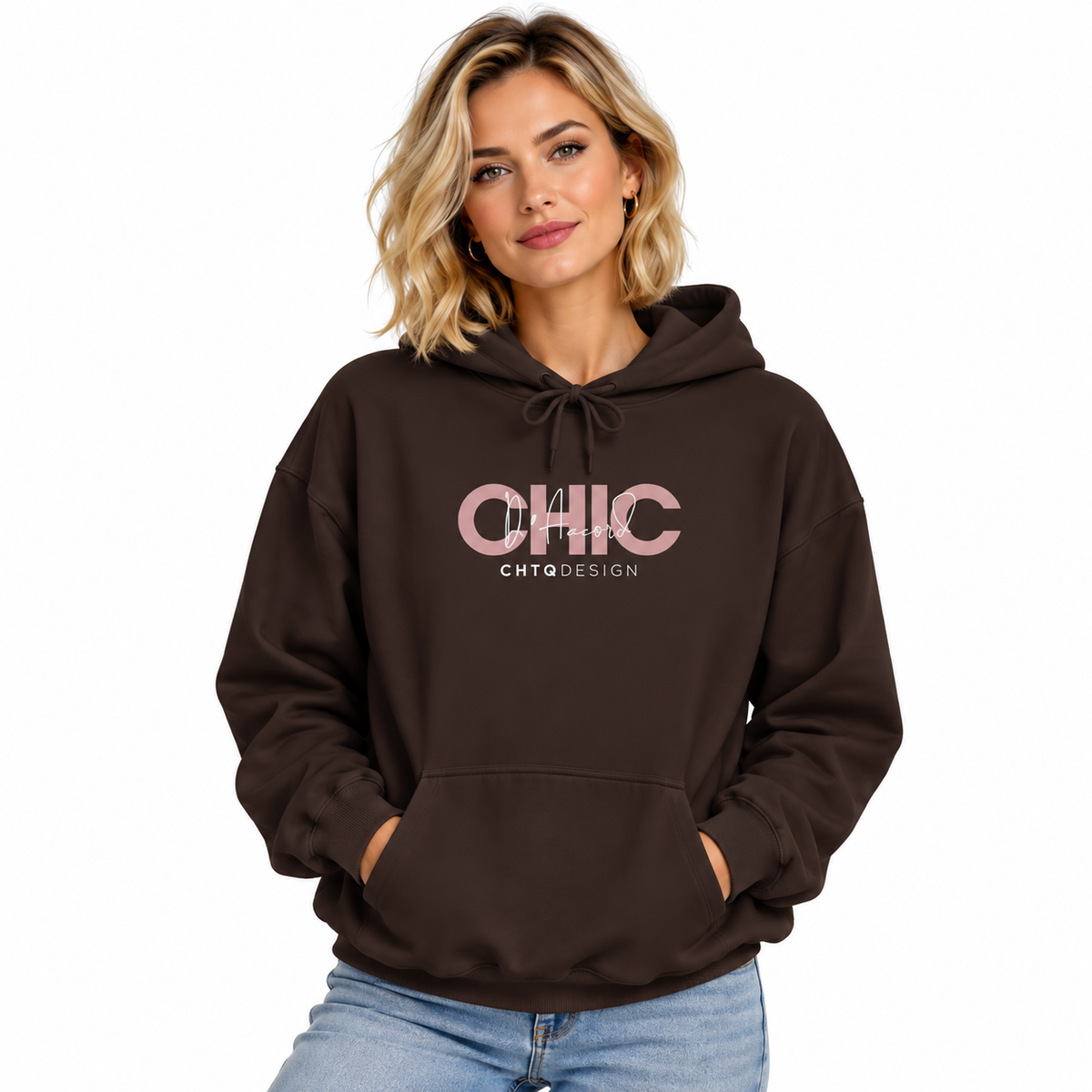 Woman wearing CHIC D’Accord graphic hoodie in brown with light denim jeans