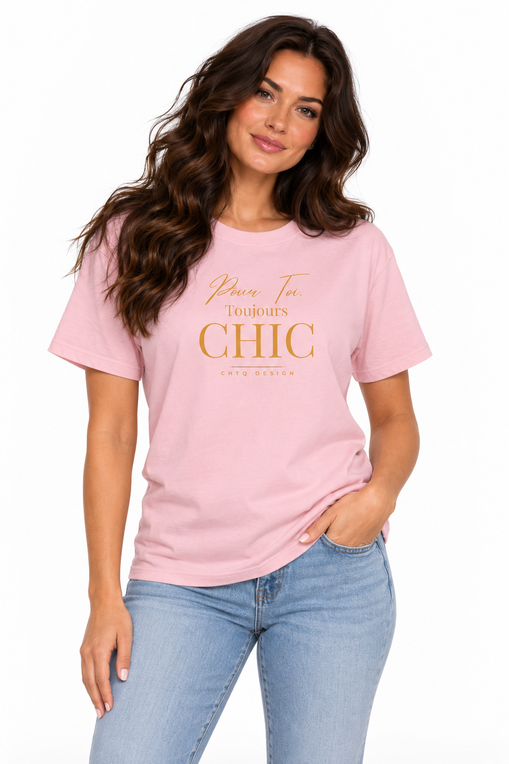 Woman wearing a pink CHTQ Design T-shirt with gold “Pour Toi. Toujours CHIC” typography, styled with light blue jeans.