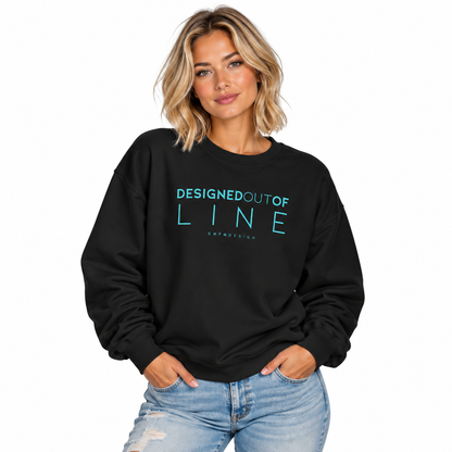 Woman wearing a black Designed Out of Line crewneck sweatshirt by CHTQ Design with turquoise graphic text.
