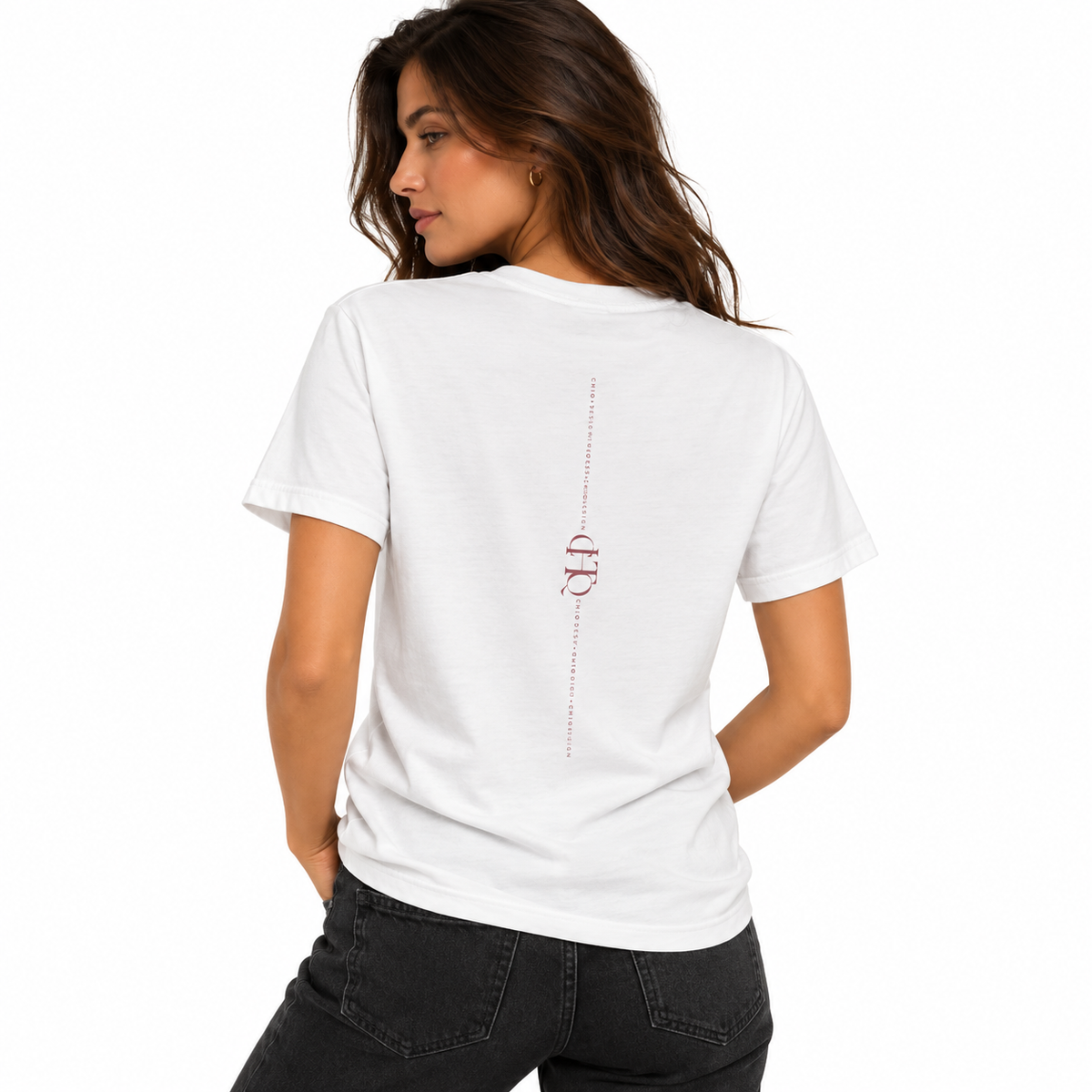 Woman wearing a white CHTQ Design T-shirt shown from the back with vertical CHTQ graphic