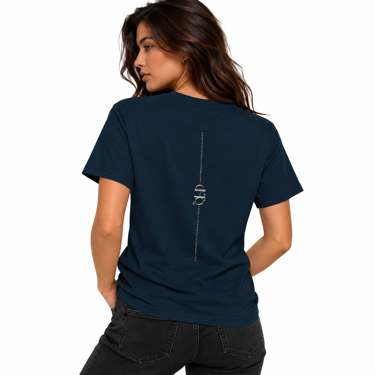 Woman wearing a navy CHTQ Design T-shirt shown from the back with vertical CHTQ graphic