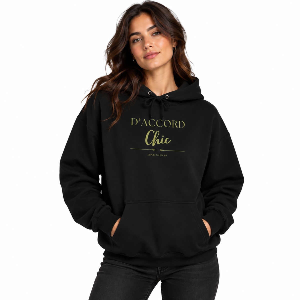 A woman modeling a black pullover hoodie with 'D'ACCORD Chic' printed in gold on the chest, set against a plain white background.