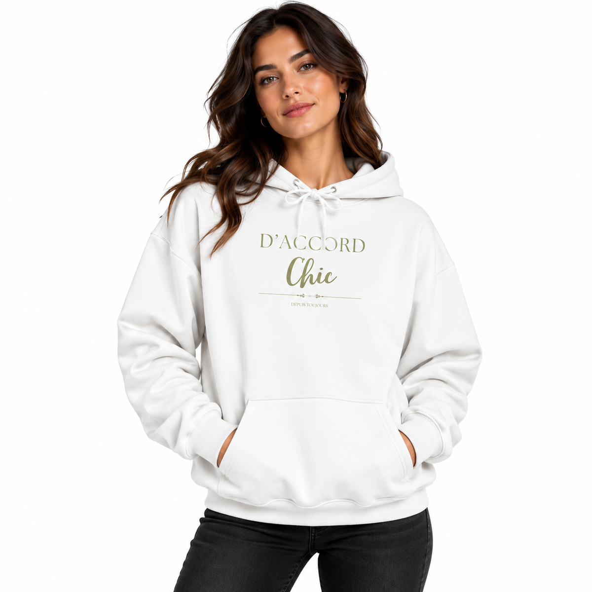 A woman wearing a white pullover hoodie with 'D'ACCORD Chic' printed in gold on the chest, paired with black pants, against a plain white background.