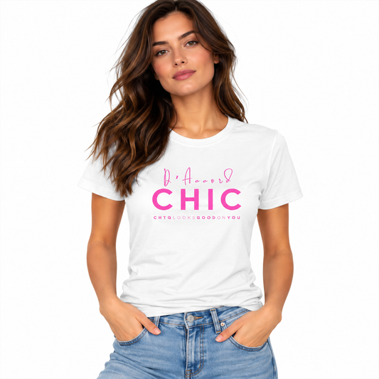 A woman wearing a white crewneck t-shirt with pink text that reads 'I Accept CHIC' and 'CHTQ LOOKS GOOD ON YOU' underneath, paired with blue jeans against a plain white background.