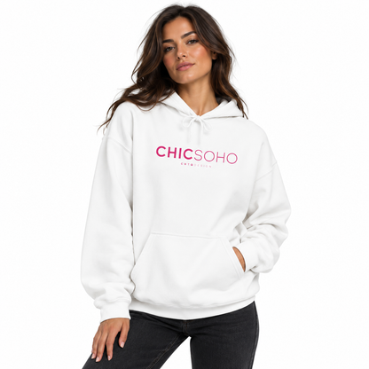 A woman modeling a white pullover hoodie with 'CHICSOHO' printed in pink across the chest, paired with black jeans against a plain white background.