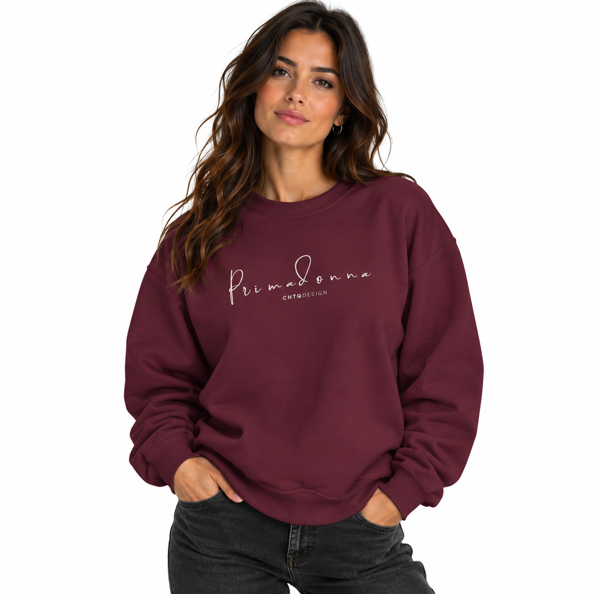 A woman wearing PRIMADONNA by CHTQ Design maroon crewneck sweatshirt featuring elegant light-colored handwritten lettering on the chest, front view on white background.
