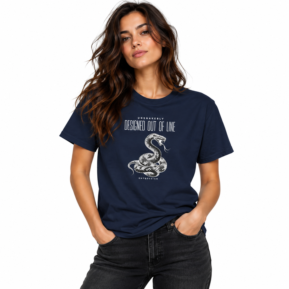 Female model wearing a navy blue UNSNAKEBLY snake graphic T-shirt with dark jeans against a white studio background.