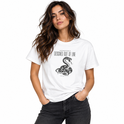Female model wearing a white UNSNAKEBLY snake graphic T-shirt with dark jeans against a white studio background.