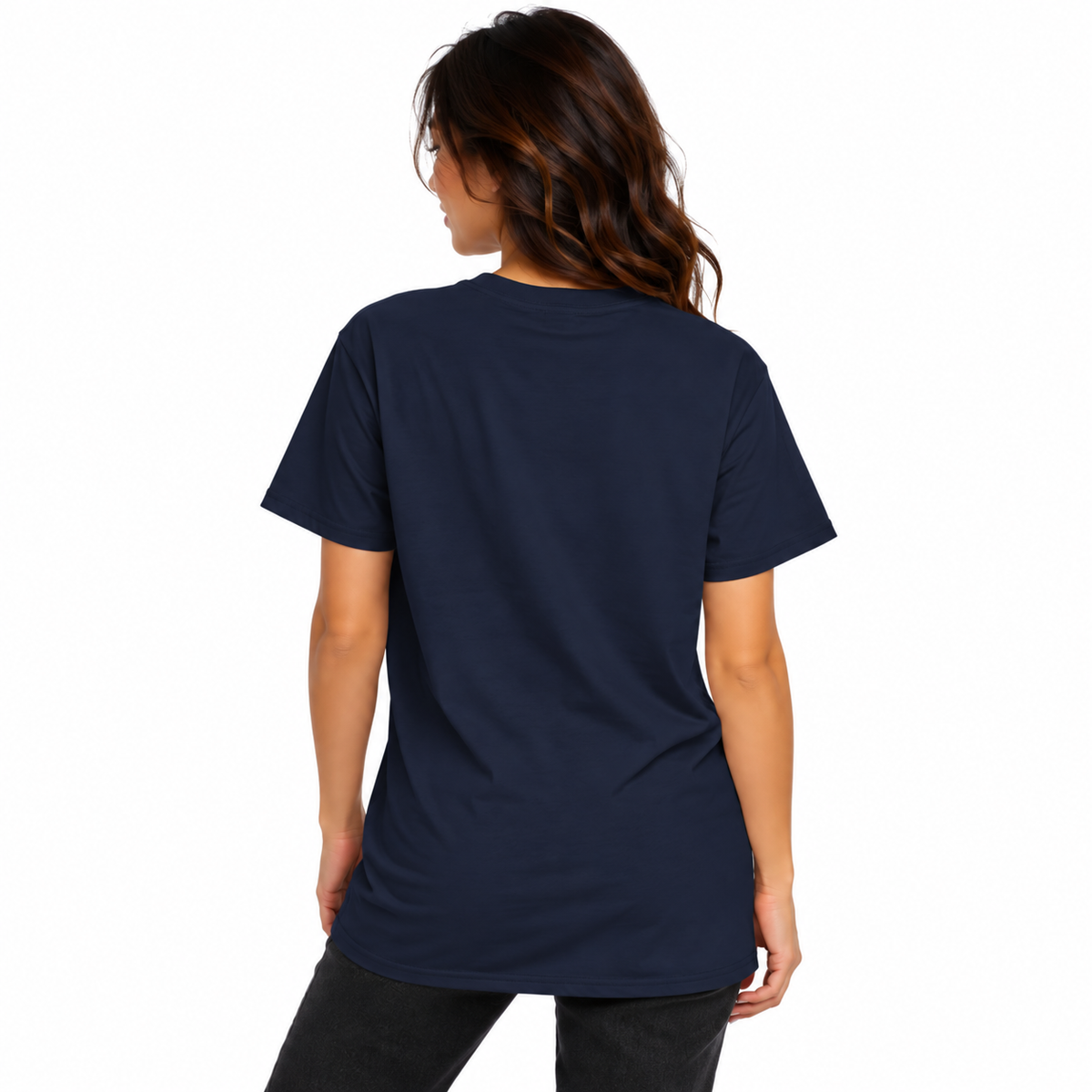 Back view of a female model wearing a navy blue UNSNAKEBLY T-shirt with a long relaxed fit and dark jeans.