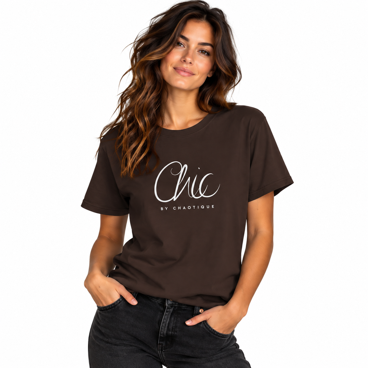 Woman modeling a dark chocolate brown Chic by Chaotique T-shirt with black jeans in a white studio setting.