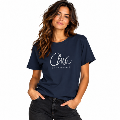 Woman wearing a navy Chic by Chaotique graphic T-shirt paired with black jeans against a white studio background.