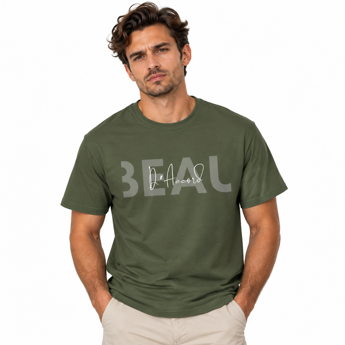 Man wearing a military green BEAU D’Accord graphic T-shirt featuring large grey BEAU lettering with white handwritten D’Accord script across the chest.