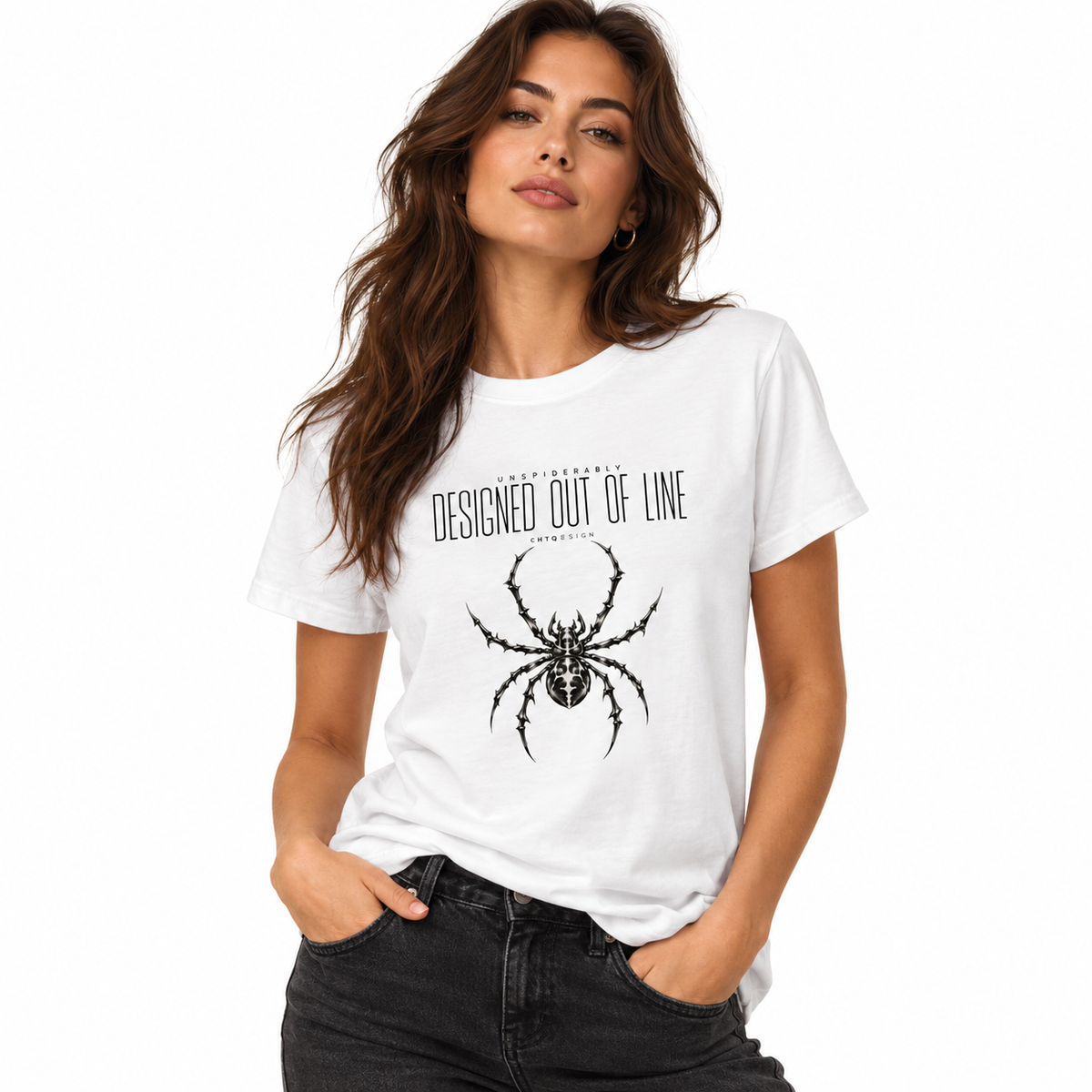 Woman wearing a white UNSPIDERABLY Designed Out of Line spider graphic T-shirt with black jeans against a white studio background