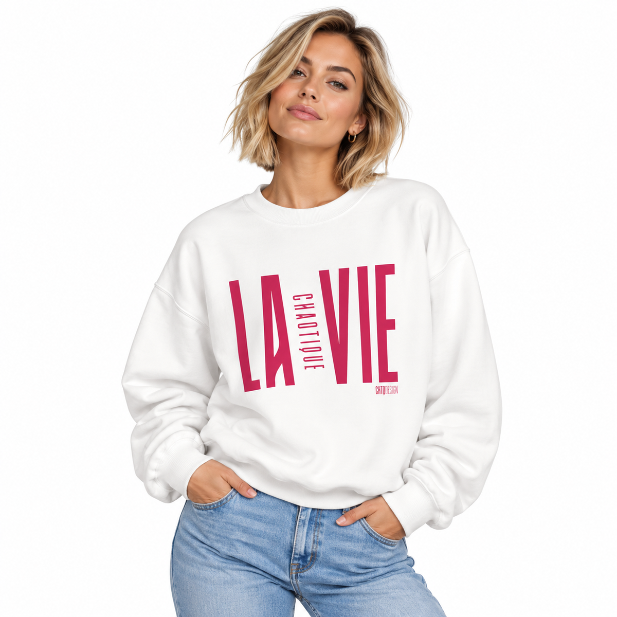 Woman wearing white LA VIE CHAOTIQUE by CHTQ Design sweatshirt with magenta graphic