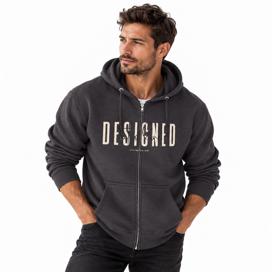 Male model wearing a dark gray Designed Out of Line zip-up hoodie with teal graphic lettering and white script on a white studio background.