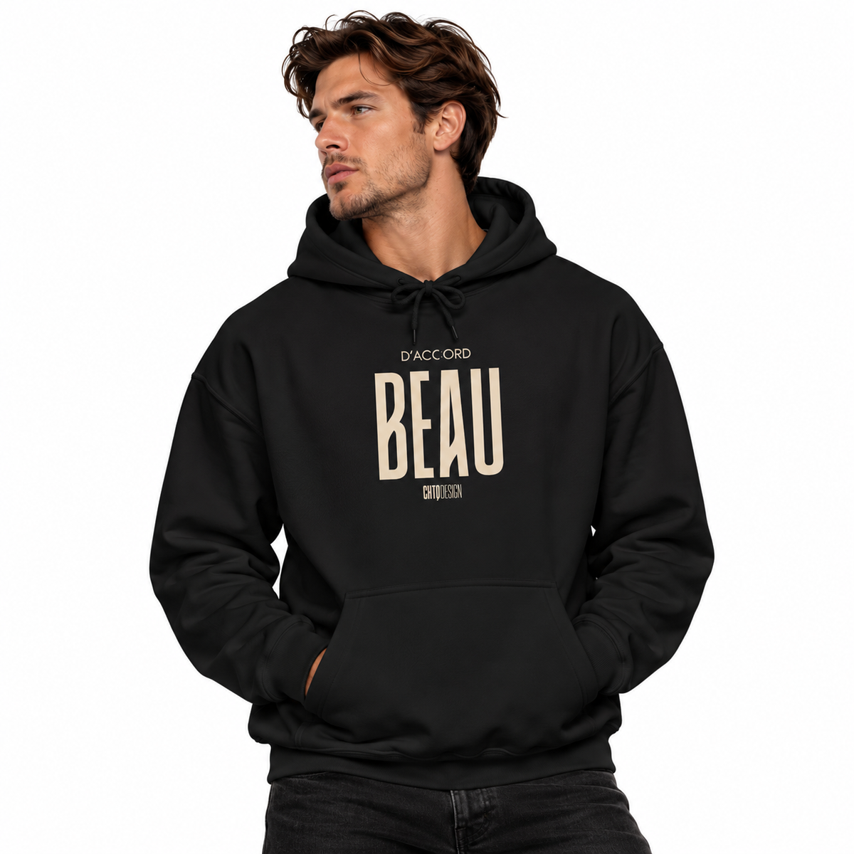 A man wearing a black pullover hoodie with a beige graphic print on the chest that reads 'D'ACCORD BEAU', posed against a solid white background.